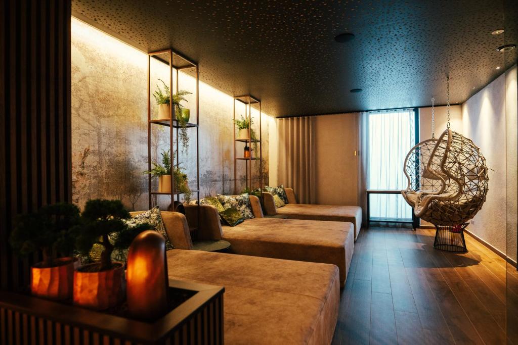 Posezení v ubytování Adler Hotel Wellness & Spa - Andalo