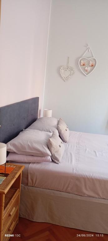 Łóżko lub łóżka w pokoju w obiekcie A casa di Fabio