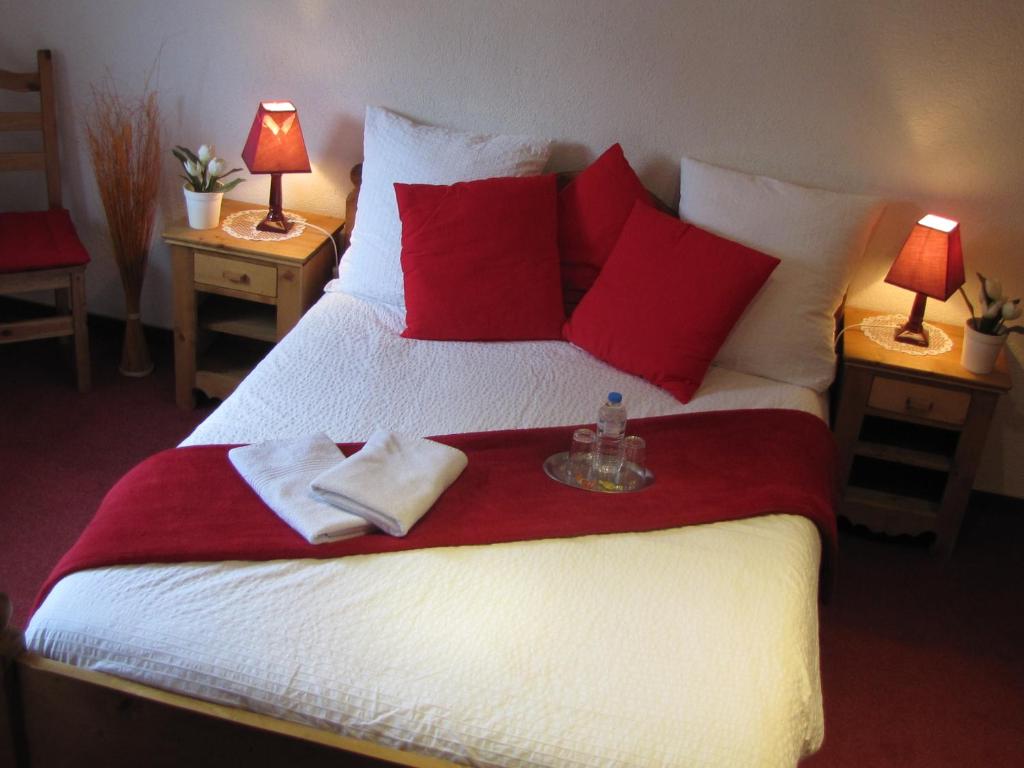 Postel nebo postele na pokoji v ubytování Maison d'Hôtes Douce Nuit