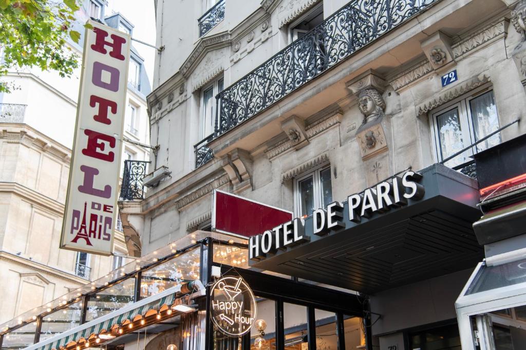 a hotel of paris sign on the side of a building at Grand Hôtel De Paris in Paris