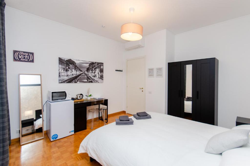 Postel nebo postele na pokoji v ubytování Silver Room