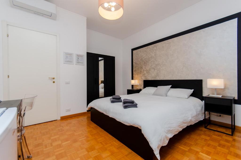 Postel nebo postele na pokoji v ubytování Silver Room