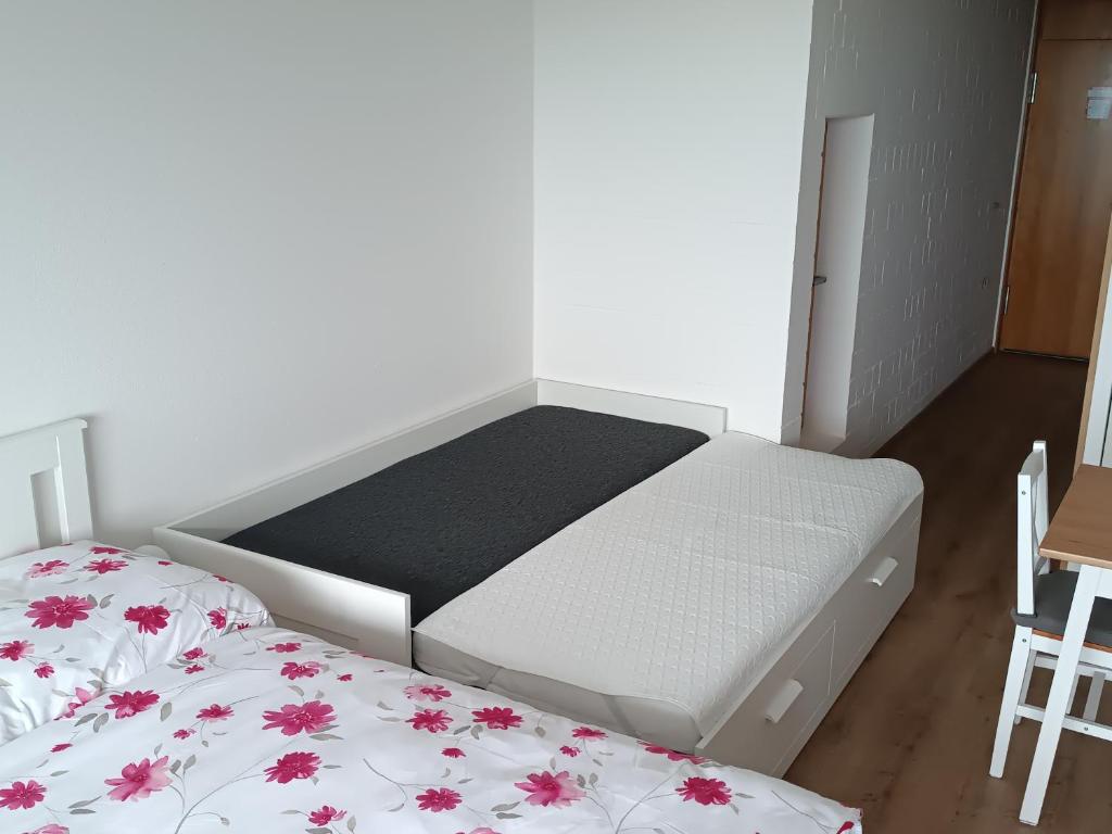 Postel nebo postele na pokoji v ubytování Apartmán Petr Sankt Englmar, Bayerische Wald