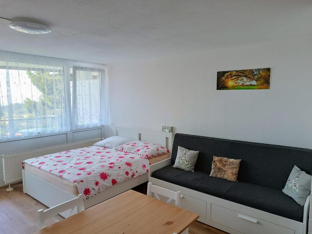 Postel nebo postele na pokoji v ubytování Apartmán Petr Sankt Englmar, Bayerische Wald