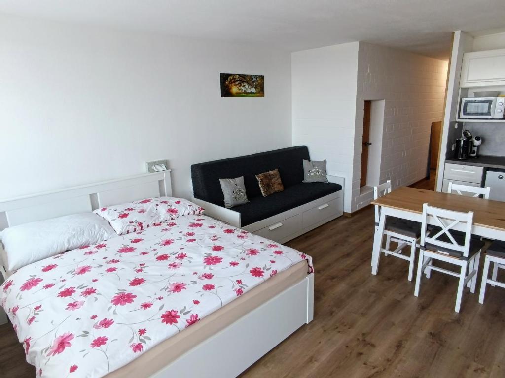Postel nebo postele na pokoji v ubytování Apartmán Petr Sankt Englmar, Bayerische Wald
