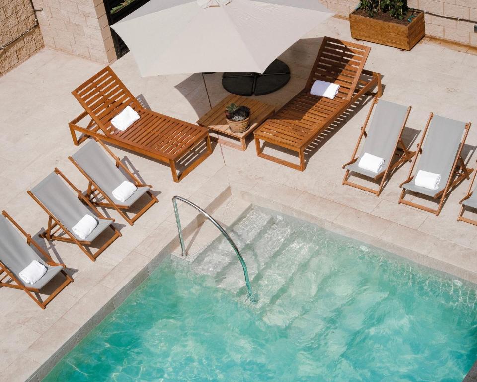 Bazén v ubytování Hotel Bon Repòs l'Ametlla de Mar nebo v jeho okolí