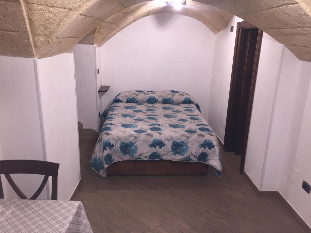 Postel nebo postele na pokoji v ubytování L'Angolo del Salento