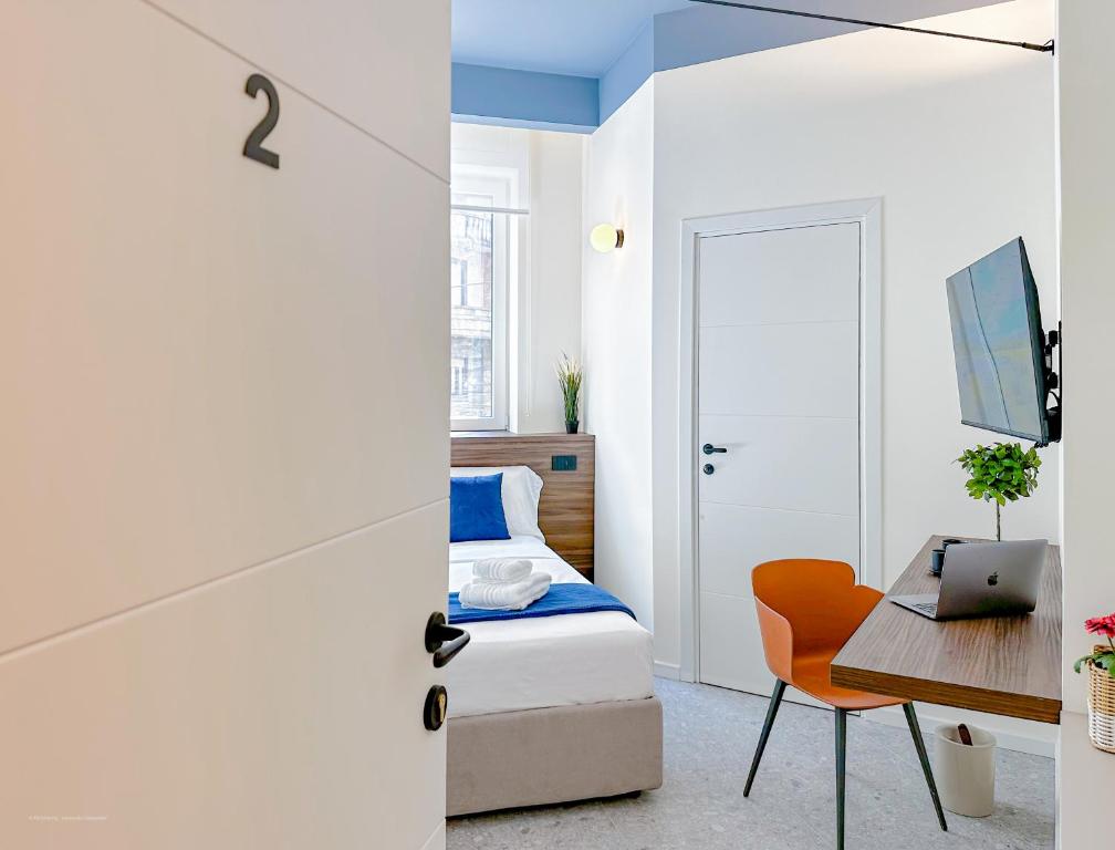 TV a/nebo společenská místnost v ubytování Porta Venezia - Luxy Suites - 6 camere