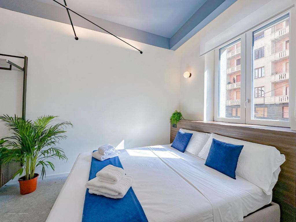Postel nebo postele na pokoji v ubytování Porta Venezia - Luxy Suites - 6 camere