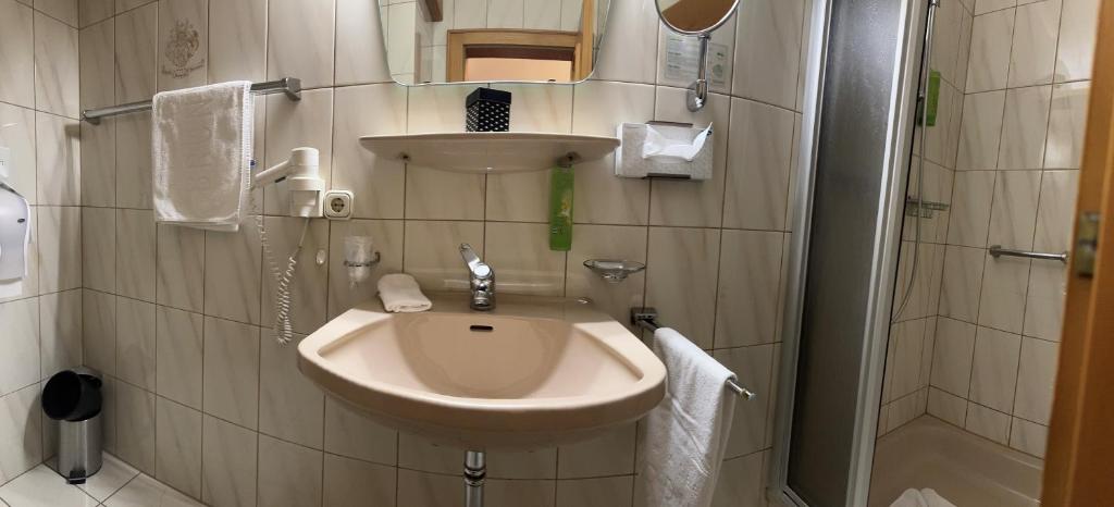 Koupelna v ubytování Seehotel Brunner
