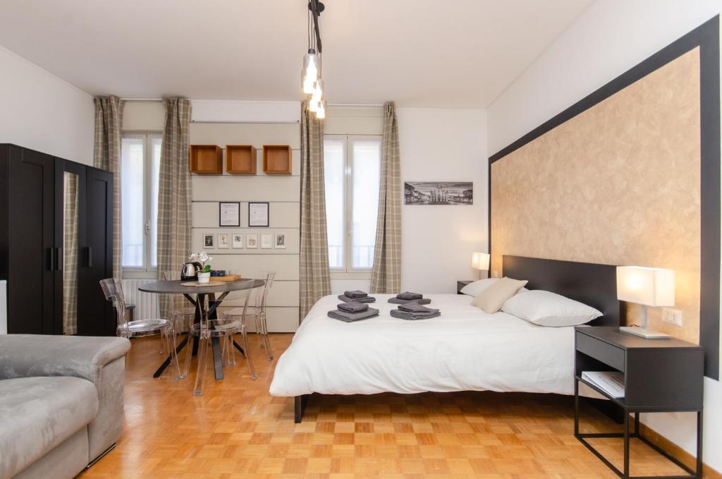 Postel nebo postele na pokoji v ubytování Brown Room
