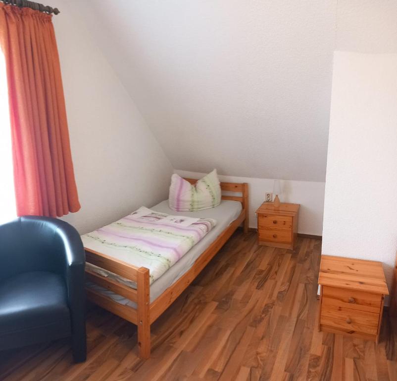 Postel nebo postele na pokoji v ubytování Garni Pension B r o c k e n h e x e