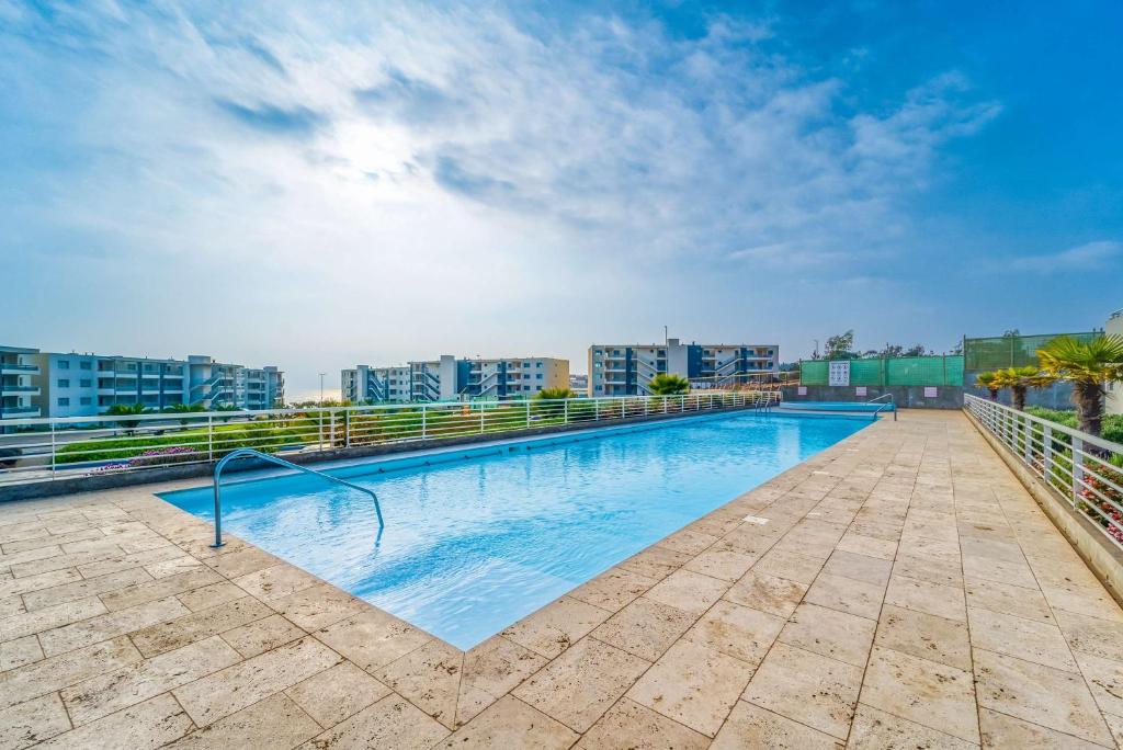 Bazén v ubytování Pacific Retreat 4D con Terraza y Salida a Playa nebo v jeho okolí