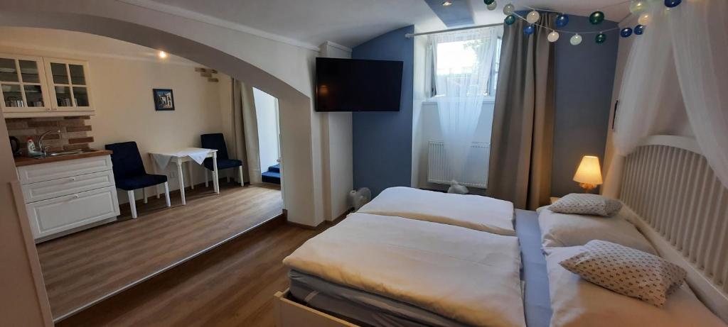 Postel nebo postele na pokoji v ubytování Hotel Excellent