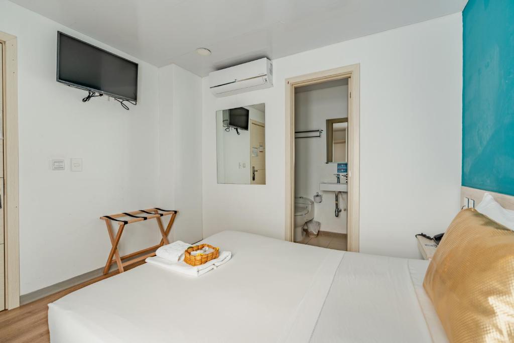 TV a/nebo společenská místnost v ubytování Hotel Quinto Nivel