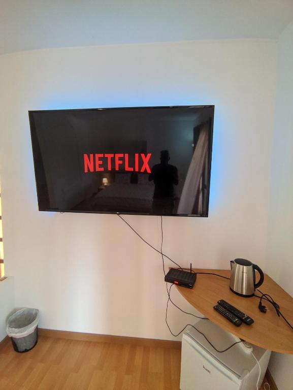 TV a/nebo společenská místnost v ubytování Casa TIANA