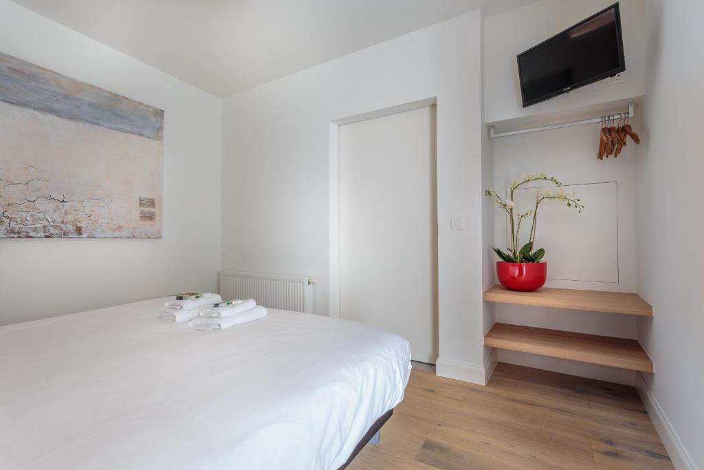 Postel nebo postele na pokoji v ubytování Hotel Bla Bla
