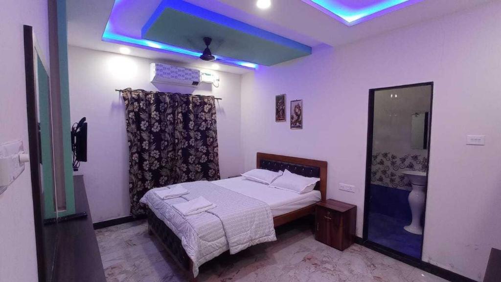 Postel nebo postele na pokoji v ubytování Hotel O Kams Coco De Parra