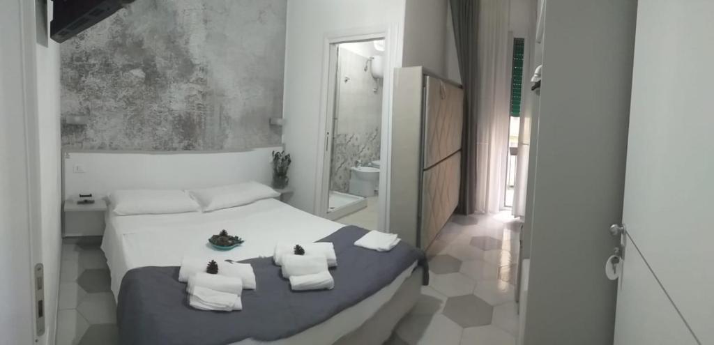 Posteľ alebo postele v izbe v ubytovaní B&B Le due costiere