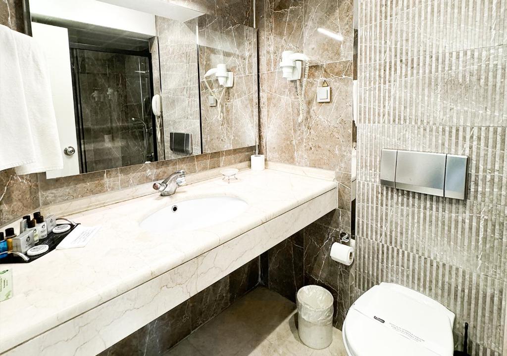 Koupelna v ubytování Aldino Hotel & Spa