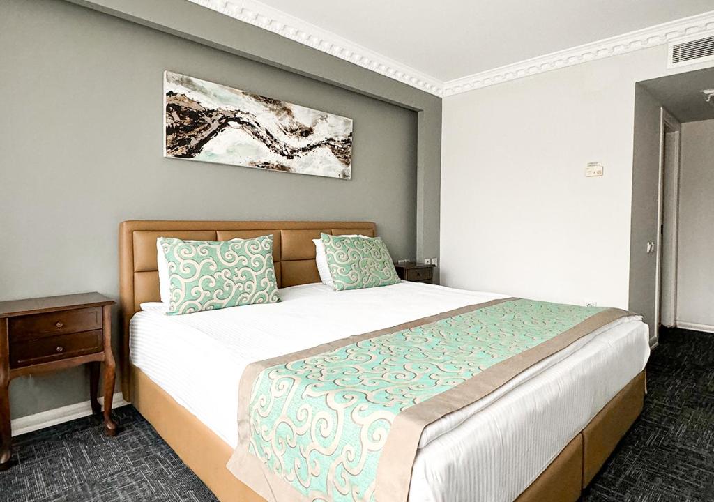 Postel nebo postele na pokoji v ubytování Aldino Hotel & Spa