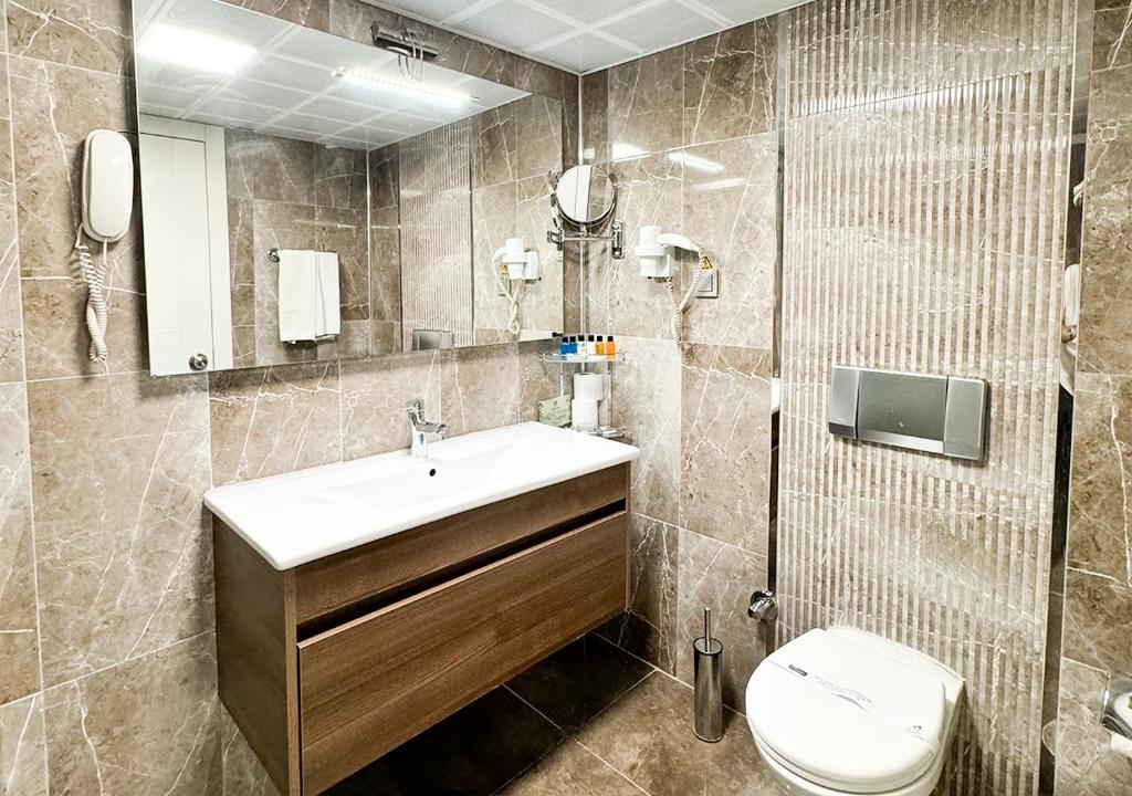 Koupelna v ubytování Aldino Hotel & Spa