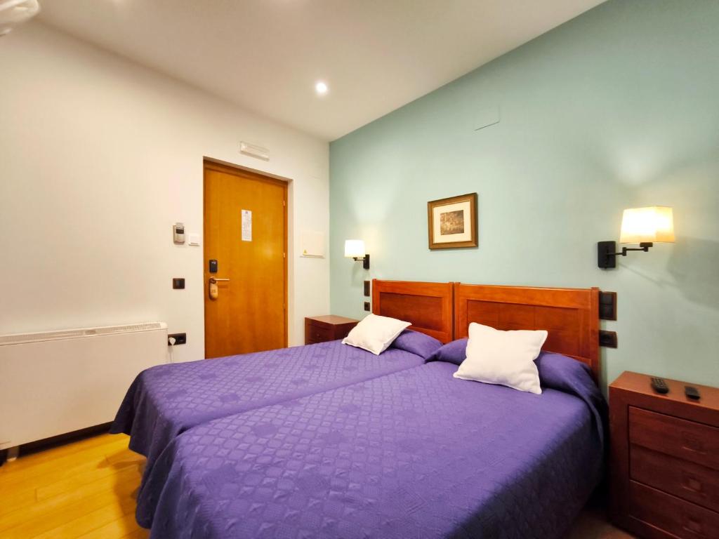 Cama o camas de una habitación en Hospedaje La Judería