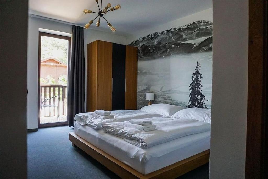 Posteľ alebo postele v izbe v ubytovaní Nadštandardný apartmán vo Valči