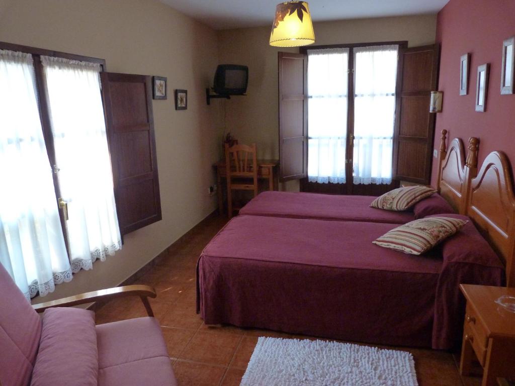 Cama o camas de una habitación en Hotel Mestas