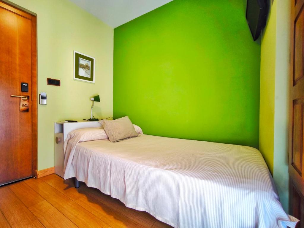 Cama o camas de una habitación en Hospedaje La Judería