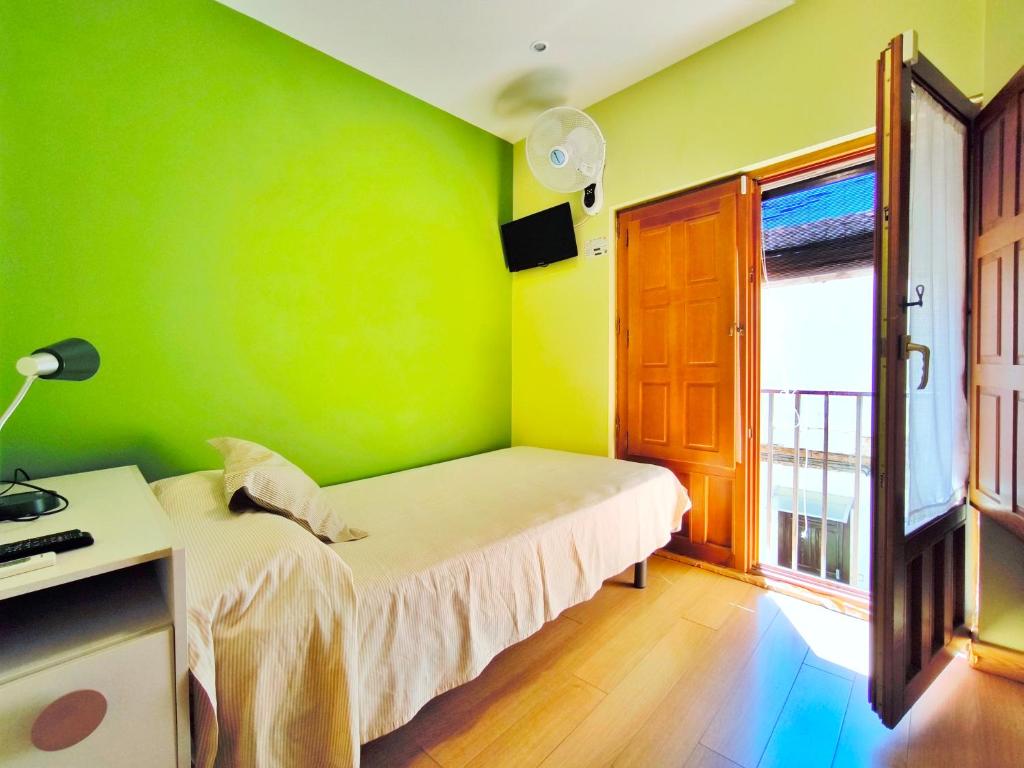 Cama o camas de una habitación en Hospedaje La Judería