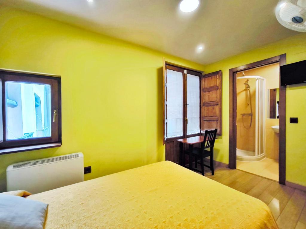 Cama o camas de una habitación en Hospedaje La Judería