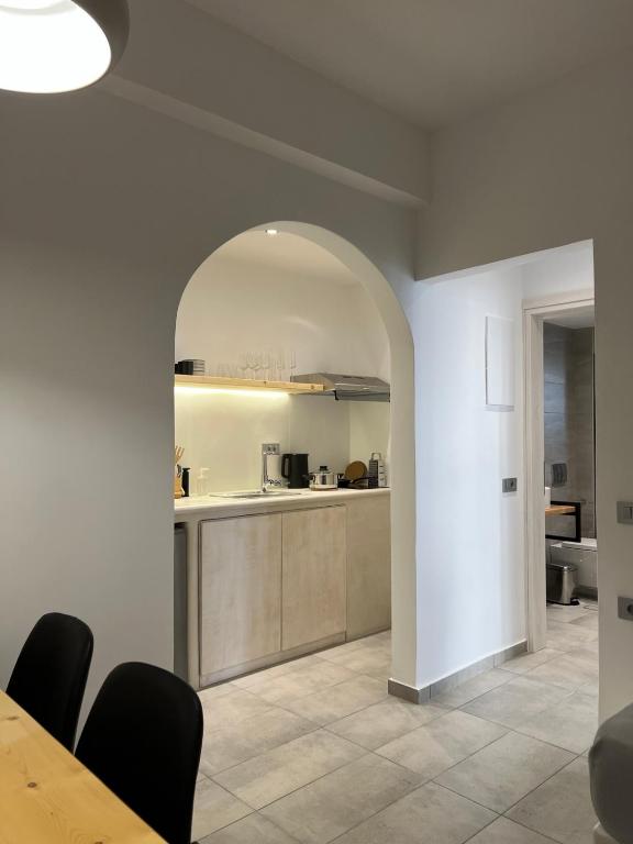 Kuchyň nebo kuchyňský kout v ubytování Santozen Suites