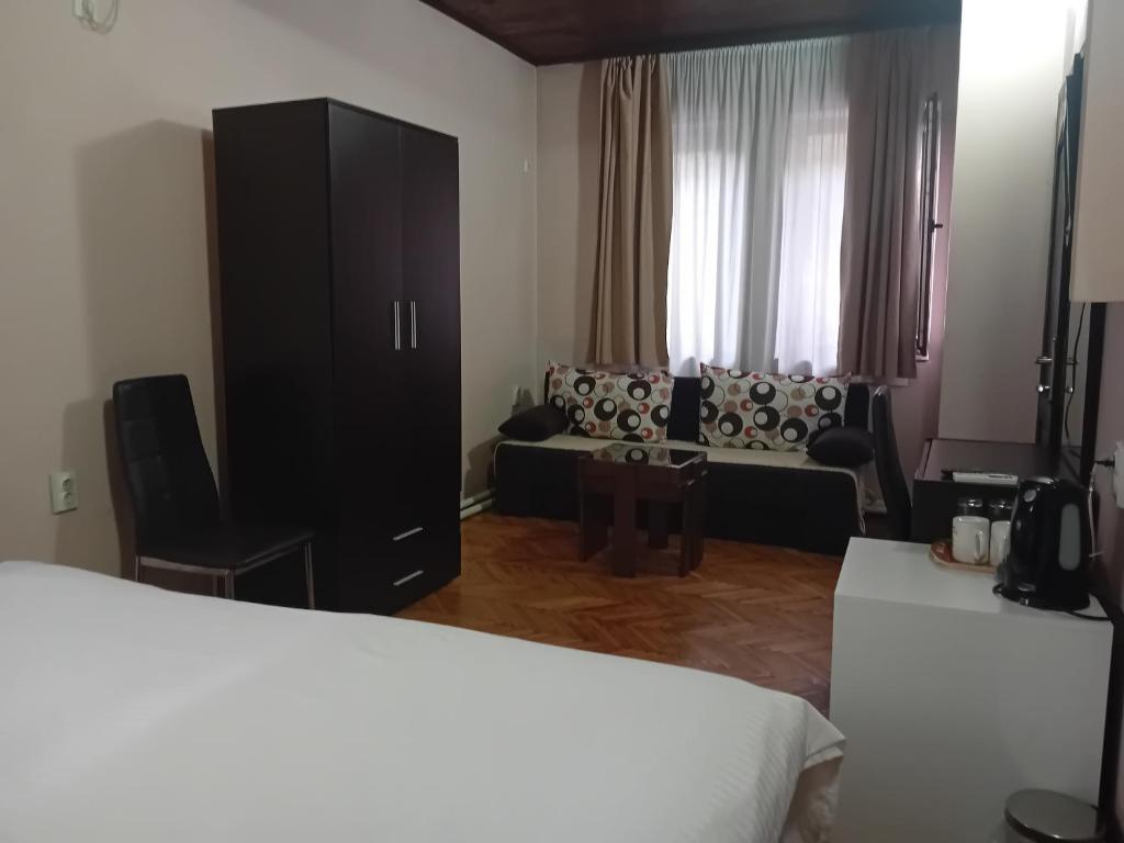 Postel nebo postele na pokoji v ubytování Vila Silia