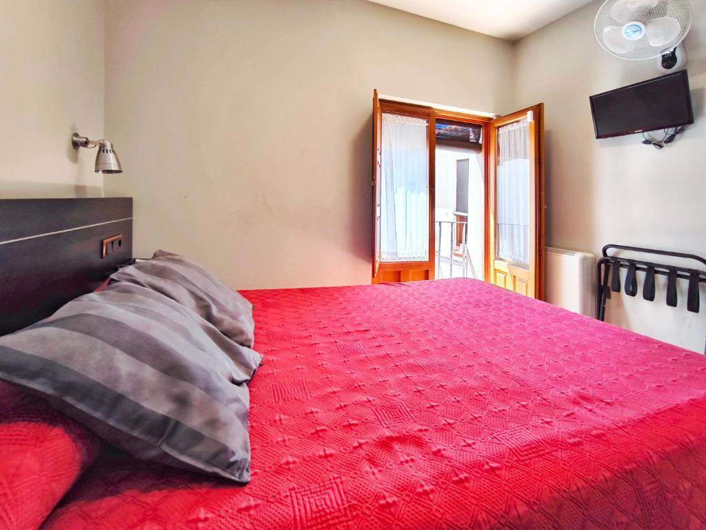 Cama o camas de una habitación en Hospedaje La Judería