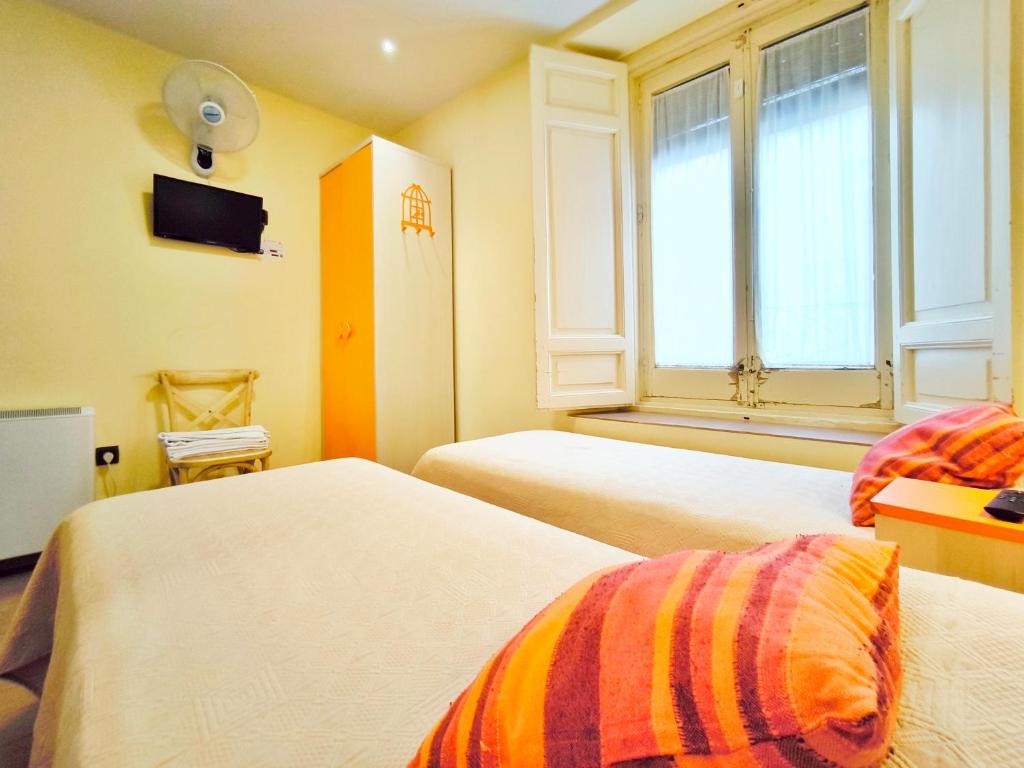 Cama o camas de una habitación en Hospedaje La Judería