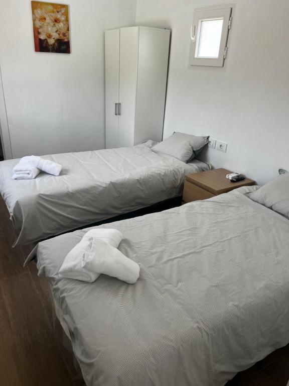 Katil atau katil-katil dalam bilik di Tantulia la casita del Caballo