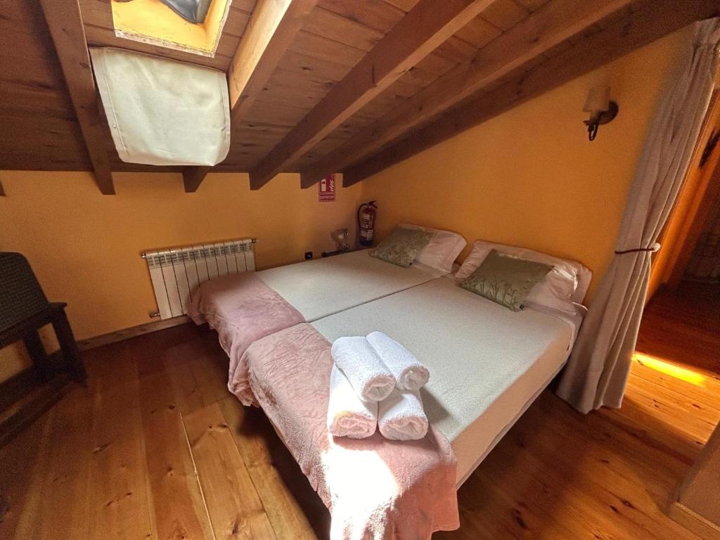 Ένα ή περισσότερα κρεβάτια σε δωμάτιο στο Casa Rural El Salvijo