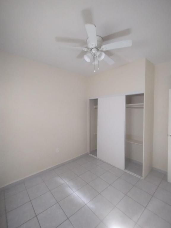 an empty living room with a ceiling fan at Horóscopo in Rancho Mesa de Tijuana