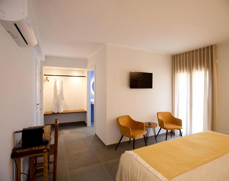 TV a/nebo společenská místnost v ubytování Hotel Mas Aguiló