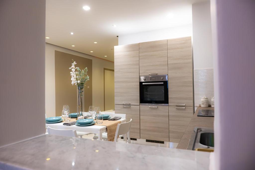 Kuchyň nebo kuchyňský kout v ubytování Gibi & Lumo Apartment's by ELDI