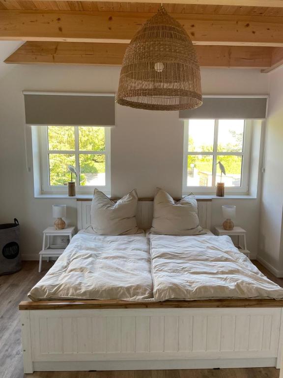 Postel nebo postele na pokoji v ubytování Linnebarg Hus 2