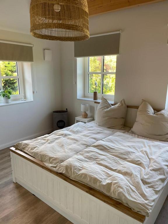 Postel nebo postele na pokoji v ubytování Linnebarg Hus 2