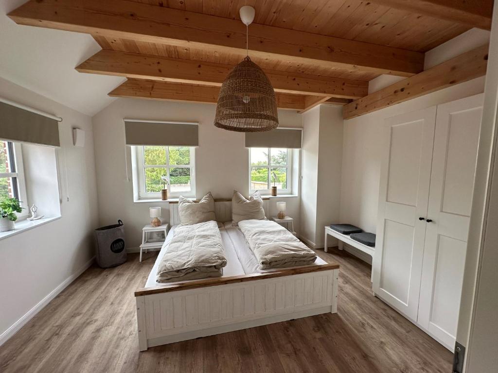 Postel nebo postele na pokoji v ubytování Linnebarg Hus 2