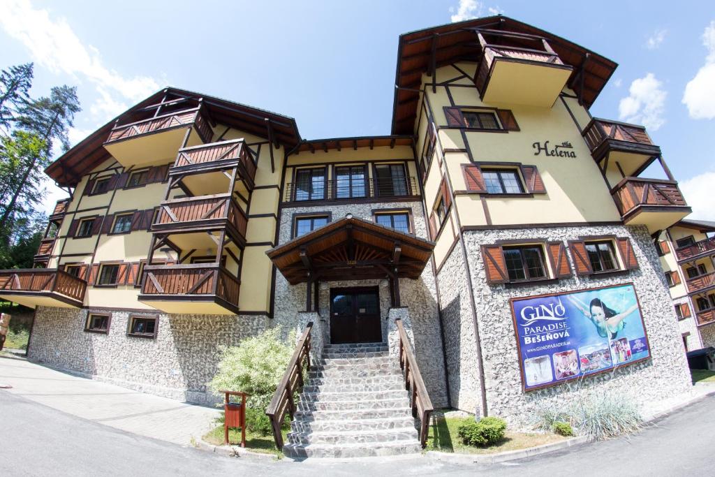 a building with stairs in front of it at Vila Helena - Apartment Helena 2 in Ružomberok