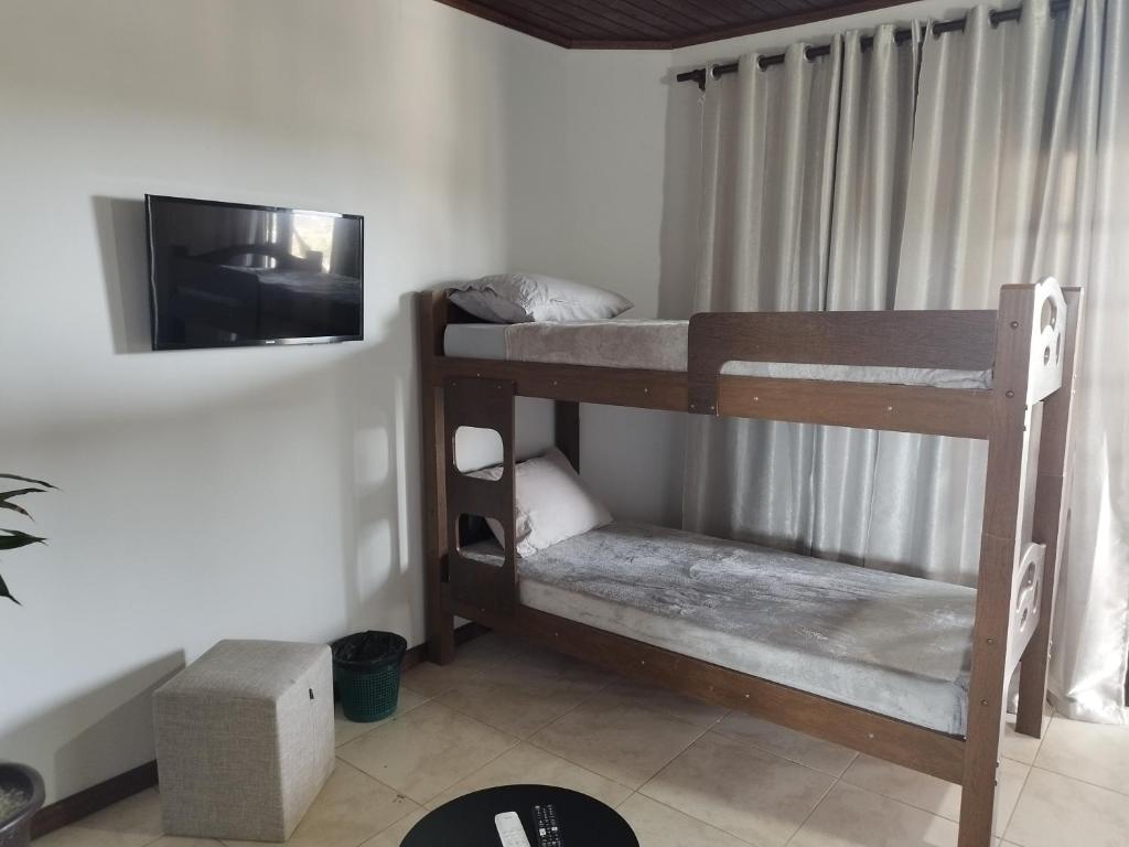 Postel nebo postele na pokoji v ubytování Dom João Pousada