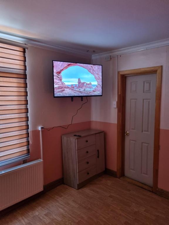 TV a/nebo společenská místnost v ubytování Gauchito Patagón