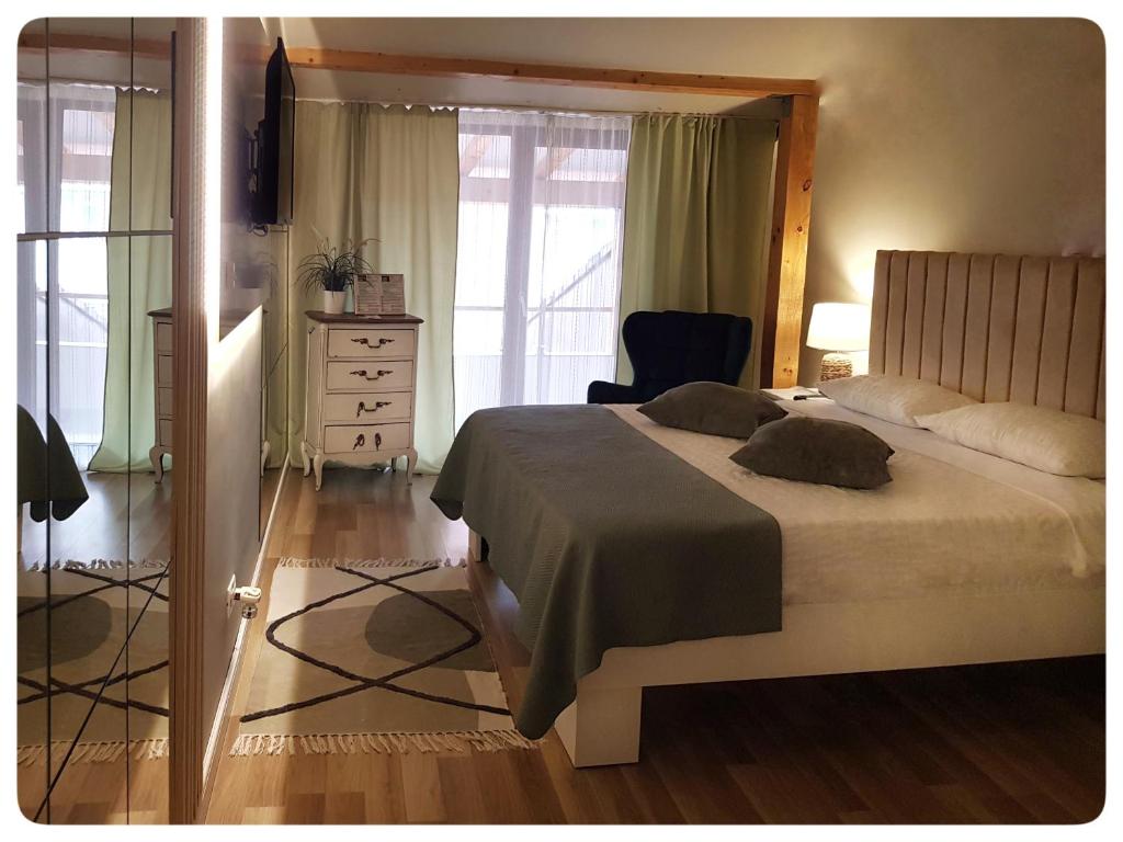 Postel nebo postele na pokoji v ubytování Elania Residence