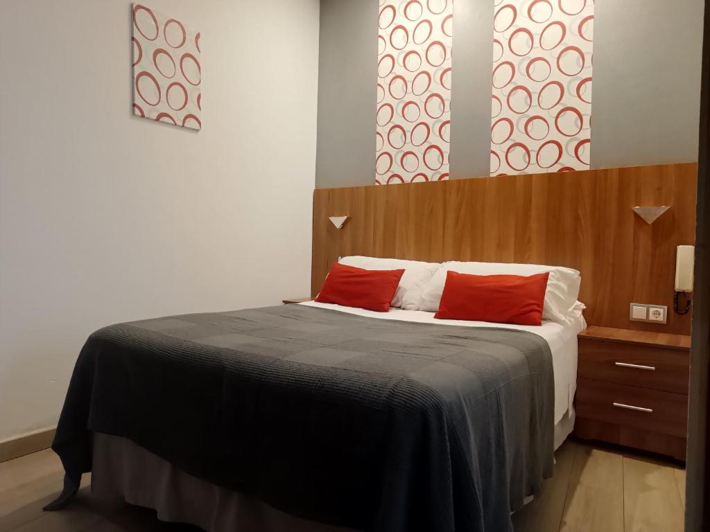 Postel nebo postele na pokoji v ubytování Hostal San Francisco