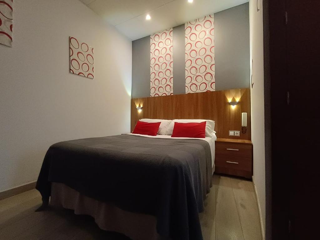 Postel nebo postele na pokoji v ubytování Hostal San Francisco